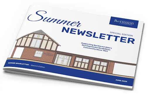 A booklet with the words "Summer Newsletter" and a rendering of a tudor style home on the cover.