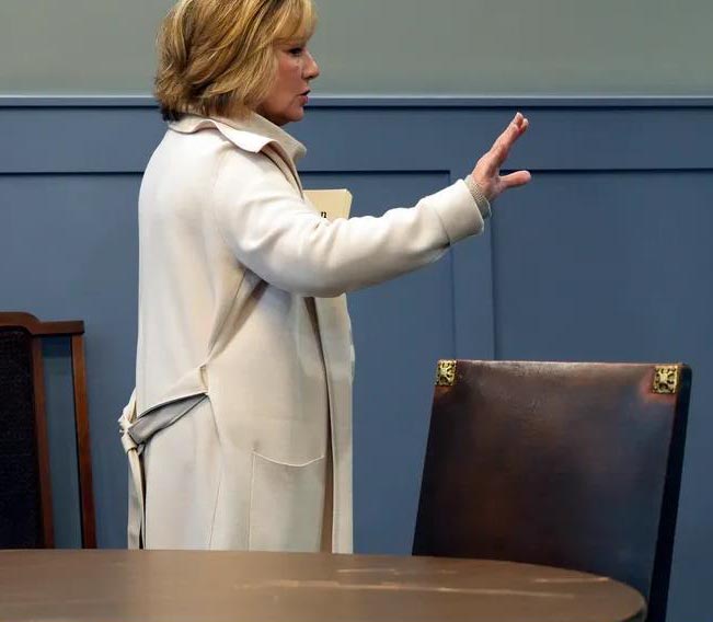 Margaret Skinner points out chairs from her grandparents' home.